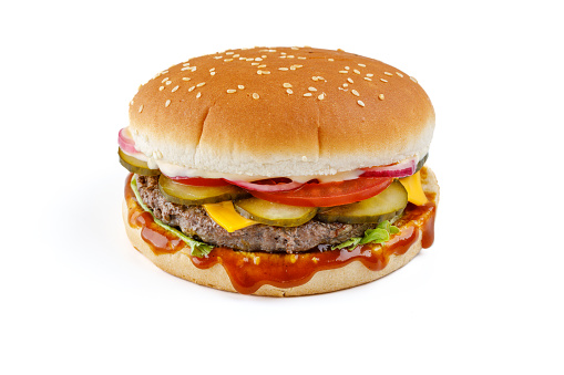 hamburger like in McDonald's with a beef cutlet on a white background, studio shooting