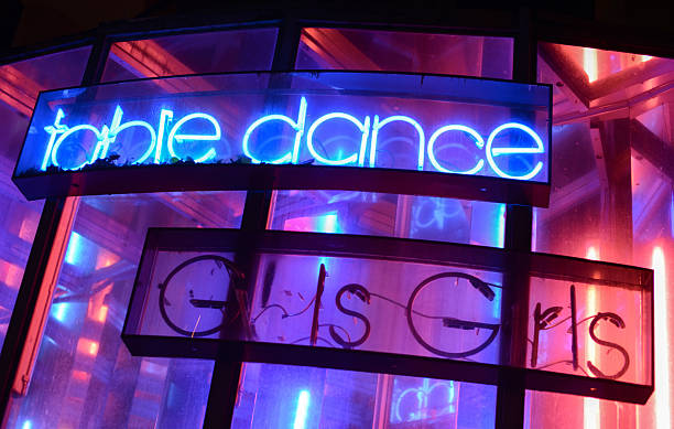 Table Dance Neon Sign Run-down table dance neon sign at the Reeperbahn, Hamburg (St. Pauli) strip club stock pictures, royalty-free photos & images