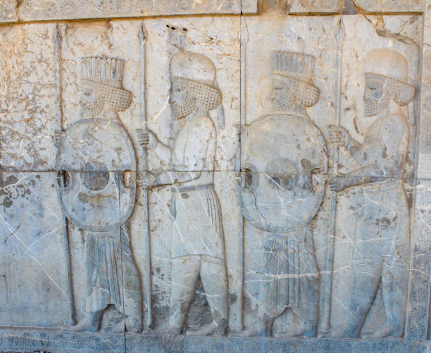 istock Persepolis, ancient bas-relief, persian warriors with spears and shields 1751868551