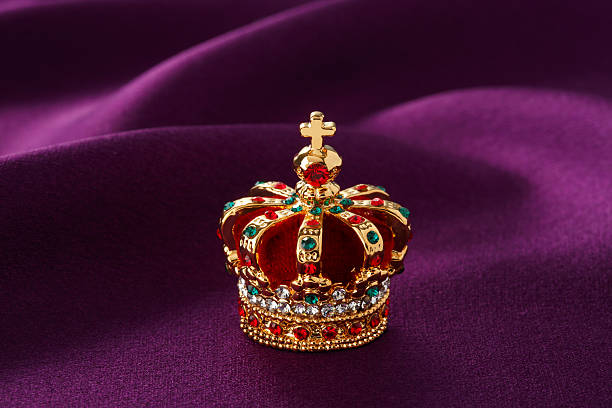 istock Red royal gold crown with various jewels 175186889