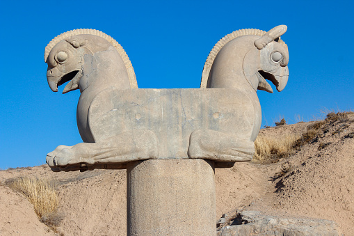 Griffin-like Huma bird column capital, the ancient Percepolis ruins, Iran