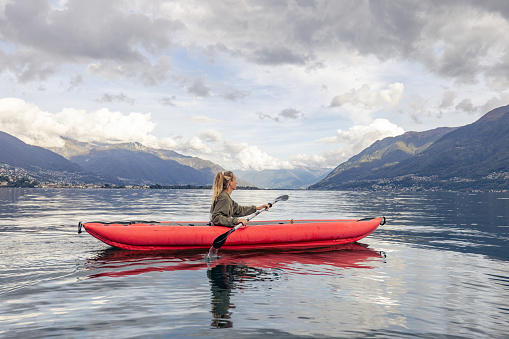 Woman canoeing on lake