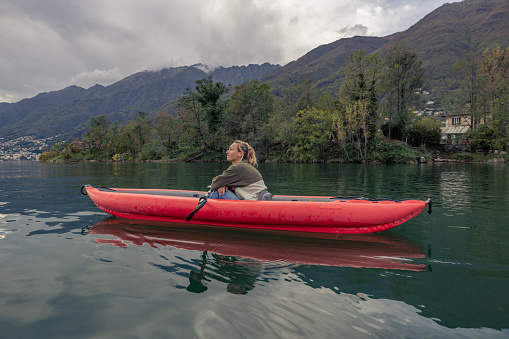 Woman canoeing on lake