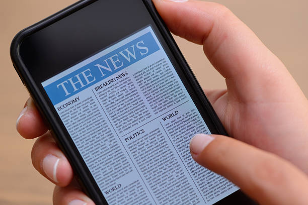 istock Reading news with smart phone 175187691
