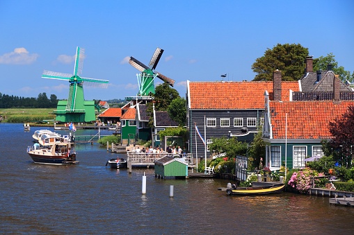 People visit Zaanse Schans restored village in the Netherlands. The popular tourist attraction had 1.6 million visitors in 2014.