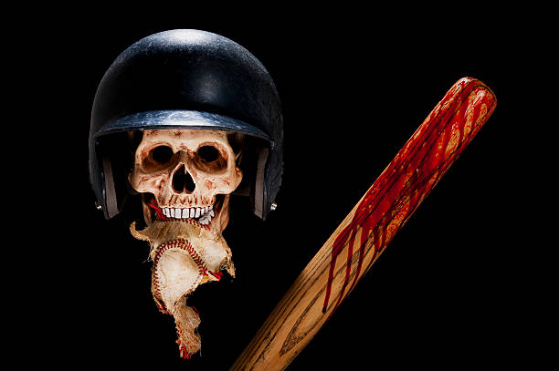 scary-baseball player - skull baseball ball stock-fotos und bilder