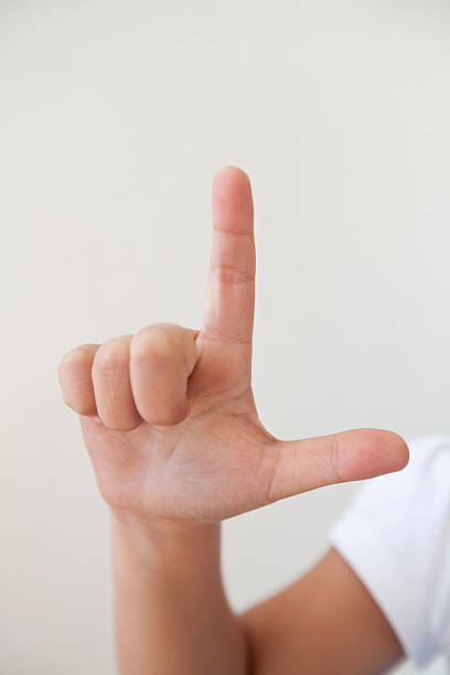 langue des signes l - letter l human hand human finger human thumb photos et images de collection