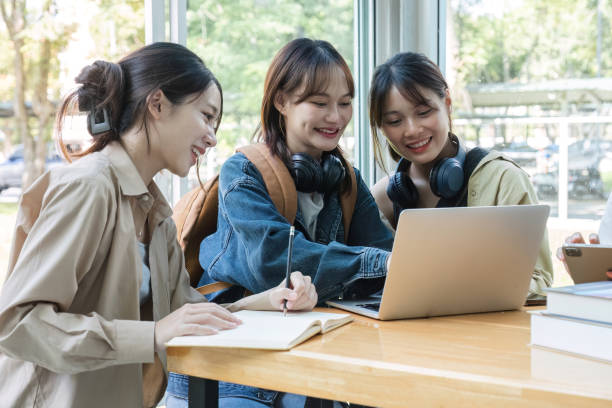 istock A group of Asian college students join together to share ideas, do homework or study with passion. 1751888450