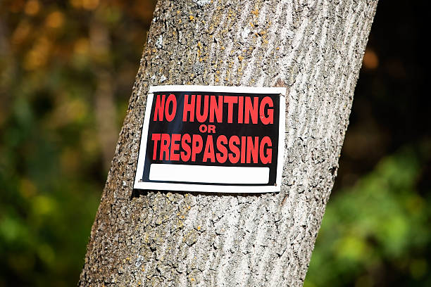 istock No Hunting or Trespassing sign on Tree Trunk 175188997