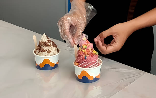 istock Ice cream that has been mixed with a swirl machine is added with cereal topping 1751894562