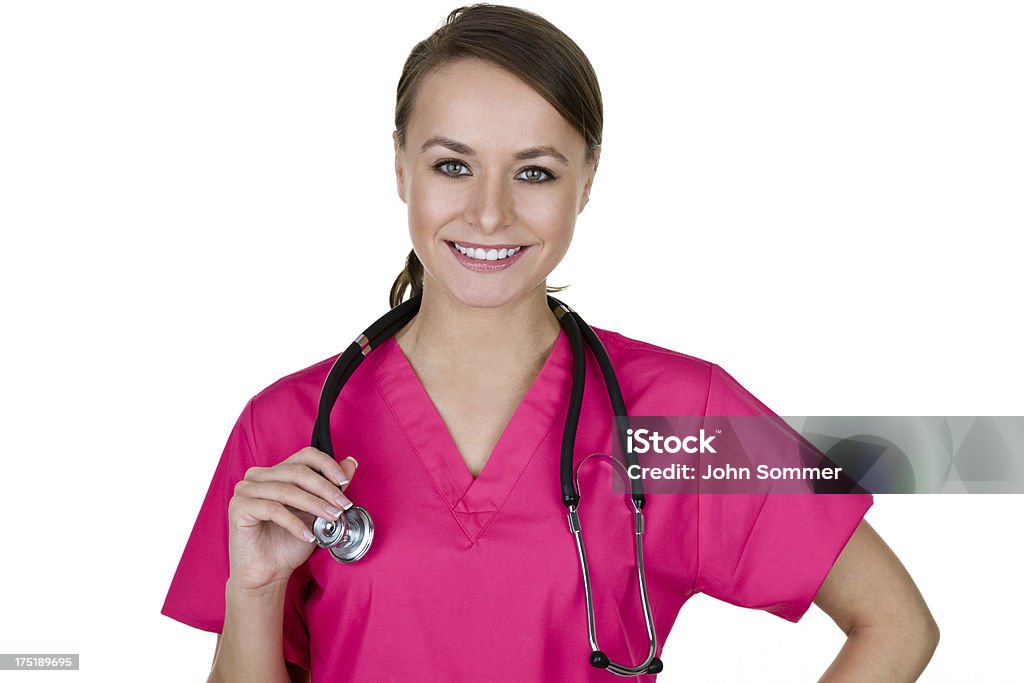 Enfermeira vestindo rosa esfoliações - Foto de stock de 20 Anos royalty-free