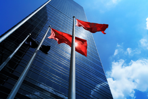 Canada flag on the building. Flag of Canada close up.