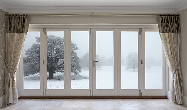 istock winter landscape through patio doors 175190341