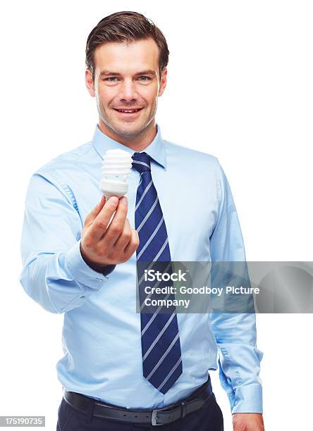 Holding The Future Of Energy Efficient Business Stock Photo - Download Image Now - Adult, Adults Only, Beautiful People