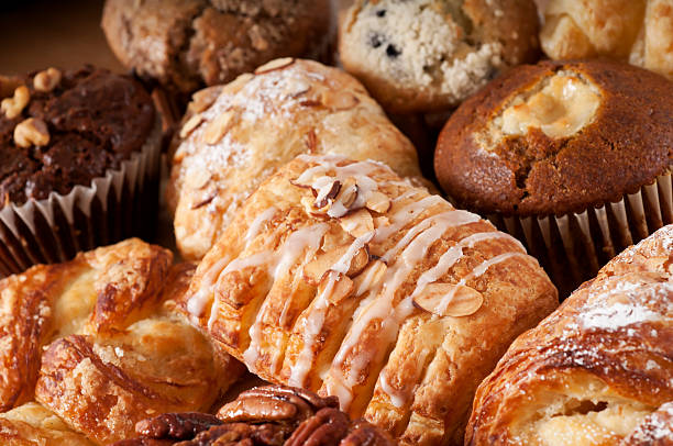 Pastries Large assortment of muffins and pastries.  Please see my portfolio for other food related images. continental breakfast photos stock pictures, royalty-free photos & images