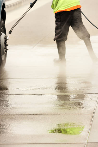 istock Cleaner Worker Steam Cleans Truck 175191052