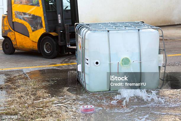 Tow Truck Spilling Dangerous Goods From Container Stock Photo - Download Image Now - Spilling, Chemical Plant, Chemical