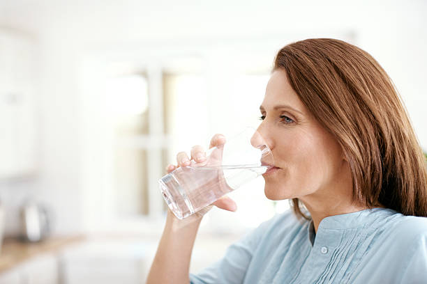 istock Enjoying a glass of cold water 175192220