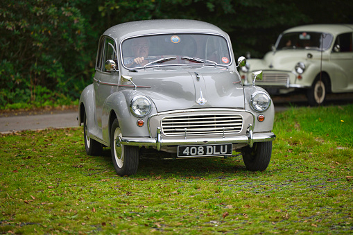 Pembrokeshire, United Kingdom - September 10, 2023: Morris Minor car - known as the 'Moggie' and built in England from 1948 until 1972, photographed at a rally at Scolton Manor, Pembrokeshire, Wales, to celebrate the 75th Anniversary of the marque.