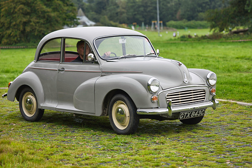 Pembrokeshire, United Kingdom - September 10, 2023: Morris Minor car - known as the 'Moggie' and built in England from 1948 until 1972, photographed at a rally at Scolton Manor, Pembrokeshire, Wales, to celebrate the 75th Anniversary of the marque.