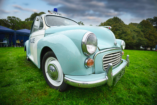 PRAGUE, CZECH REPUBLIC - APRIL 21, 2017: Vintage blue Volkswagen Beetle car, parked in front of the Rudolfinum concert hall