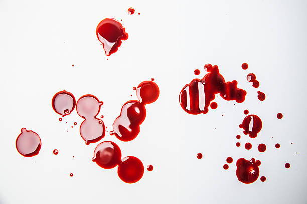 istock Red blood plasma drops and splatters on white 175193830