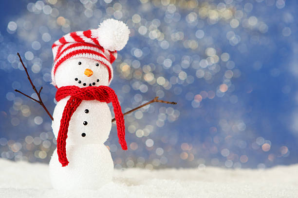 istock A cute little snowman wearing a hat and scarf 175194234