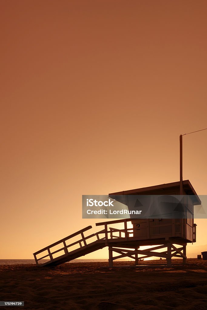 Lifeguard hut at sunset Lifeguard hut on Santa Monica beach at sunset. Accidents and Disasters Stock Photo