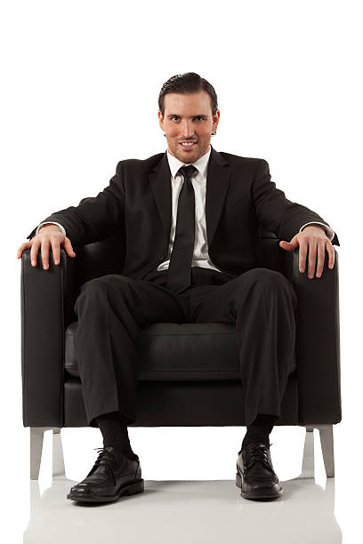 istock Confident businessman sitting in an armchair 175194791