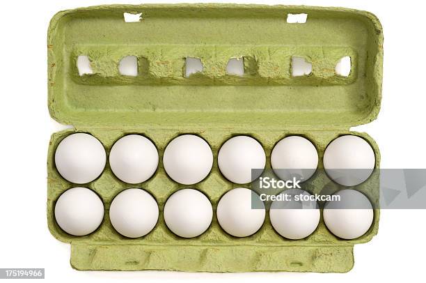 Eggs In A Carton On White Background Stock Photo - Download Image Now - Abundance, Animal Egg, Arrangement