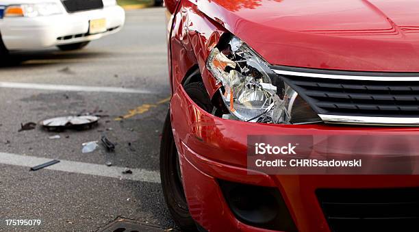 A Red Car With A Damaged Headlight After An Accident Stock Photo - Download Image Now