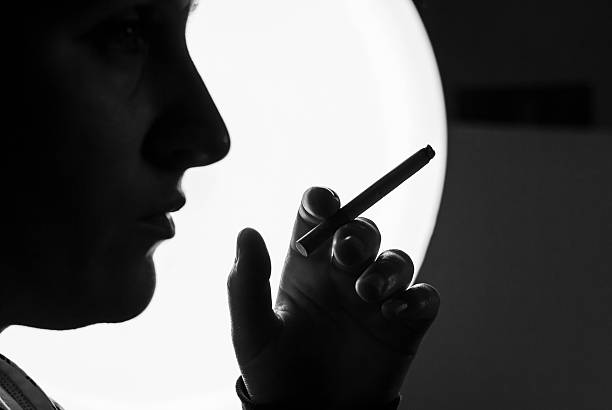 istock Young woman Smoking cigarette 175195211
