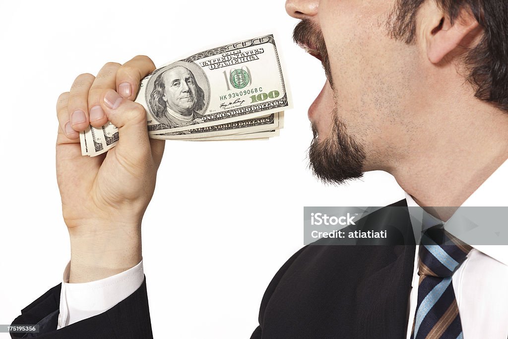 businessman eating money Adult Stock Photo