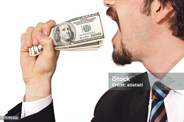 Businessman Eating Money Stock Photo - Download Image Now - Adult, Adults Only, American One Hundred Dollar Bill