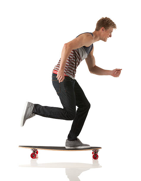 istock Profile of a man skateboarding and smiling 175195380