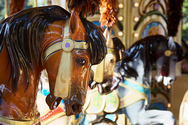 istock Horses on a carnival Merry Go Round 175195596
