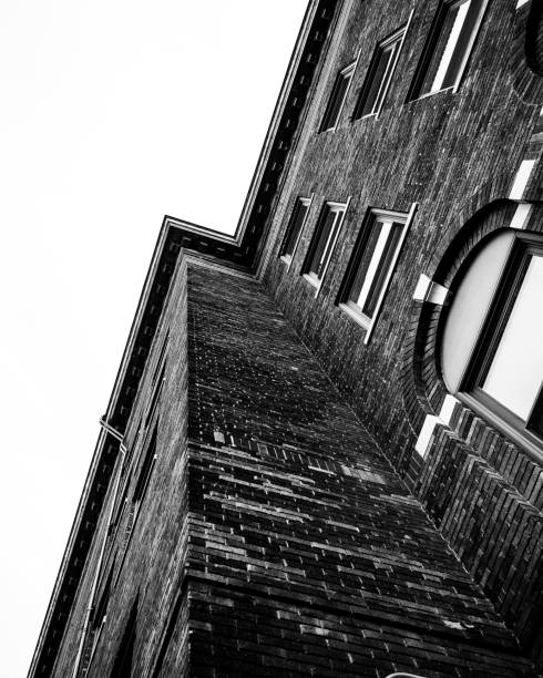 istock Low angle of a brick building in grayscale 1751958410