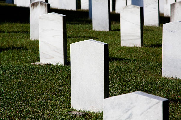 istock Rows of White Marble Headstones 175195943