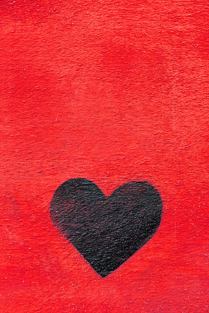 istock Graffiti heart spraypainted on red wall - Love Concept 175196044