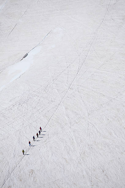 istock people hiking on a glacier 175196050