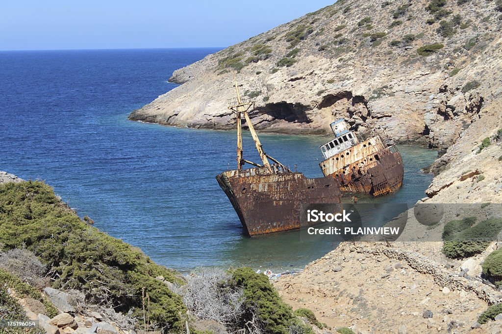 Shipwreck Rusting hulk on beach Ghost Ship Stock Photo