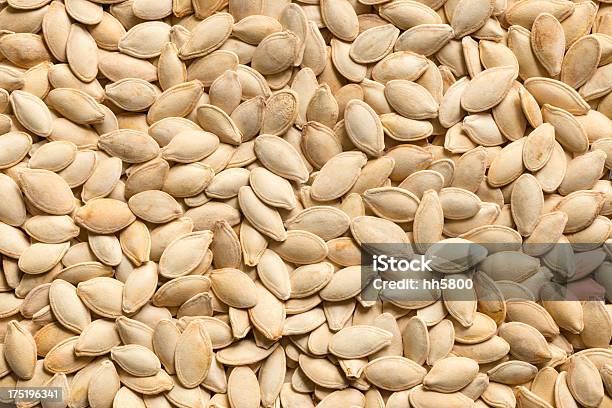 Roasted Pumpkin Seeds Backgrounds Textured Stock Photo - Download Image Now - Pumpkin Seed, Macrophotography, Toasted Food