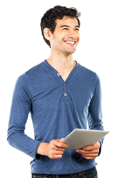 istock Smiling young man with a tablet isolated on white 175197288