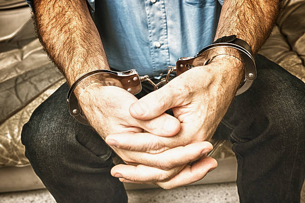 istock Man handcuffed - social issue woth legal system 175197463