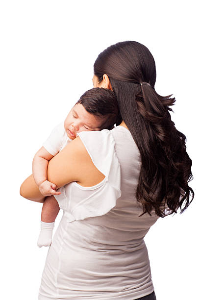 istock Cute baby sleeping in mommy's harms 175198198