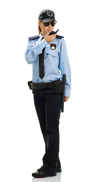 mujer agente de seguridad - isolated on white full length red protection fotografías e imágenes de stock
