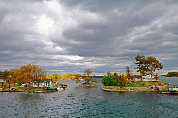 1000 Islands Cottages "Cottages in the 1000 Islands section of St Lawrence River near Kingston, Ontario" kingston ontario photos stock pictures, royalty-free photos & images