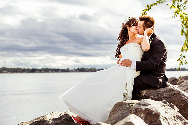 istock Couple kissing near a river 175199342