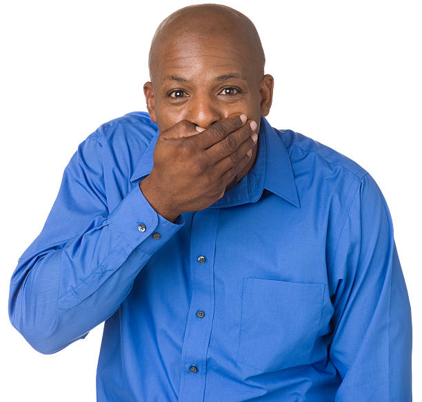 istock Excited Man Covering Mouth With Hand 175199670