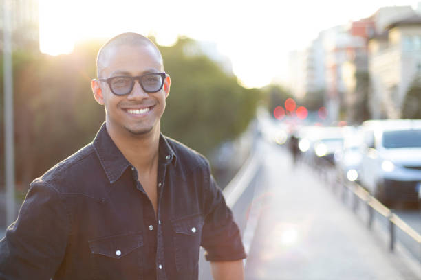 istock Smiling casual cool man standing in the city 1751998072